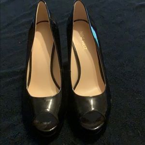 Black peep toe pumps